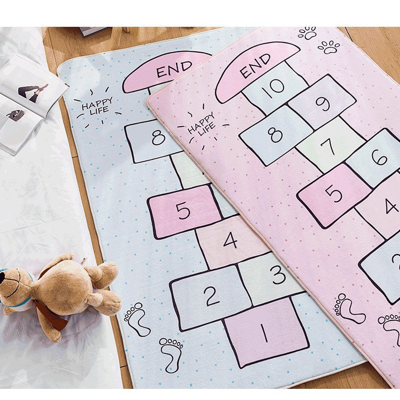 Chambre d'enfant avec tapis et couvertures de chevet