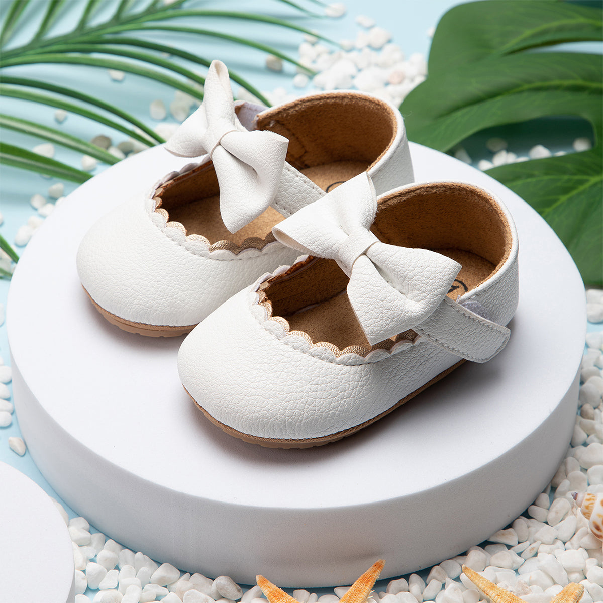 Baby-Freizeitschuhe: Flache Lauflernschuhe mit Schleife und rutschfester Gummisohle für Neugeborene