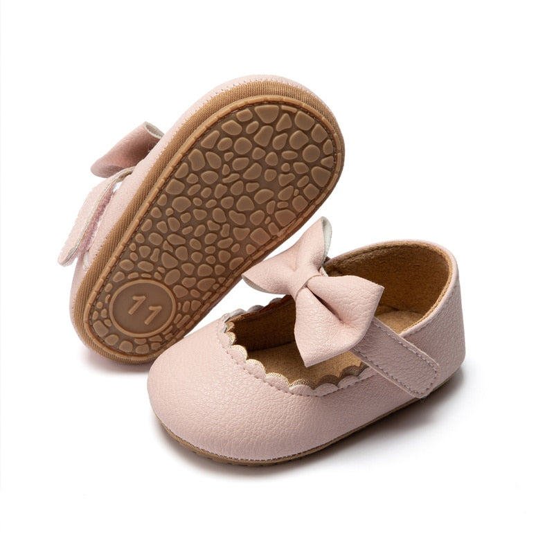 Chaussures décontractées pour bébé : premier marcheur plat avec nœud papillon pour bébé avec semelle souple en caoutchouc antidérapant pour nouveau-nés.