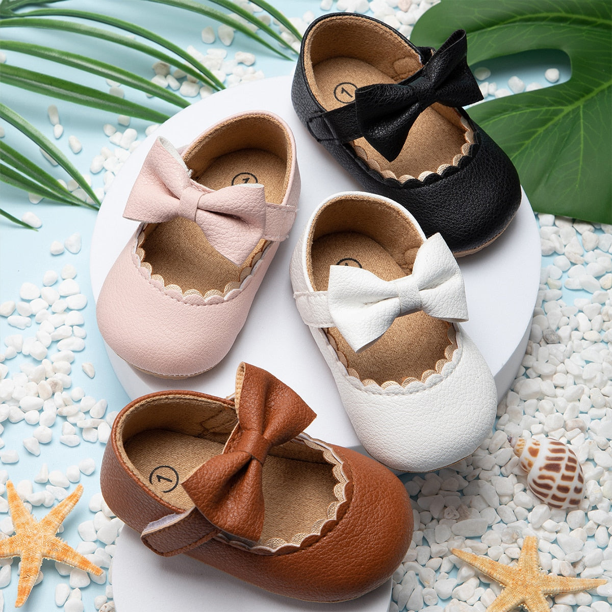 Baby-Freizeitschuhe: Flache Lauflernschuhe mit Schleife und rutschfester Gummisohle für Neugeborene